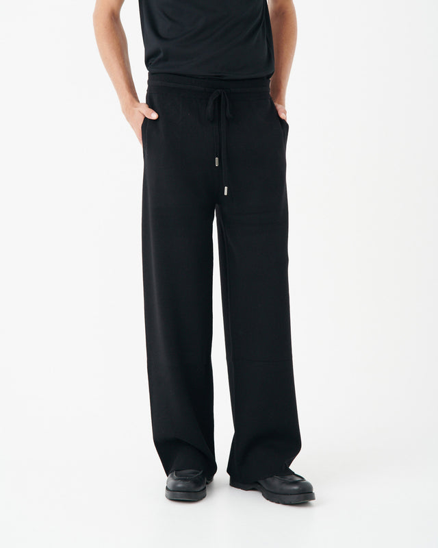 PANTALONES DE PUNTO NEGRO