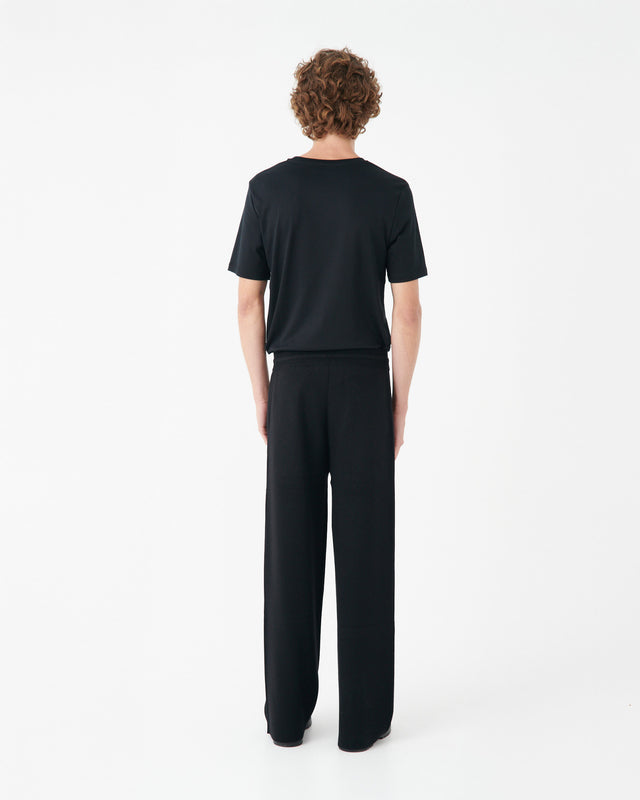 PANTALONES DE PUNTO NEGRO